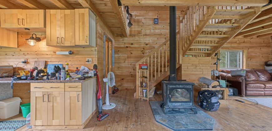 95.02-Acre Premier Whitetail Hunting Estate with Log Cabin, Pond