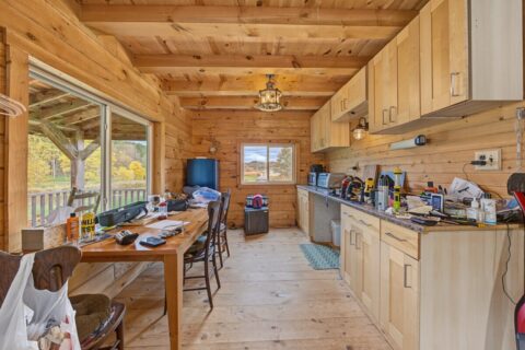 95.02-Acre Premier Whitetail Hunting Estate with Log Cabin, Pond