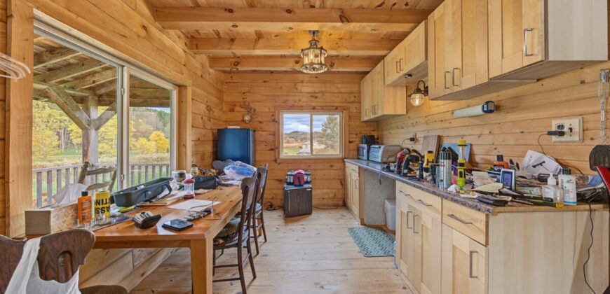 95.02-Acre Premier Whitetail Hunting Estate with Log Cabin, Pond