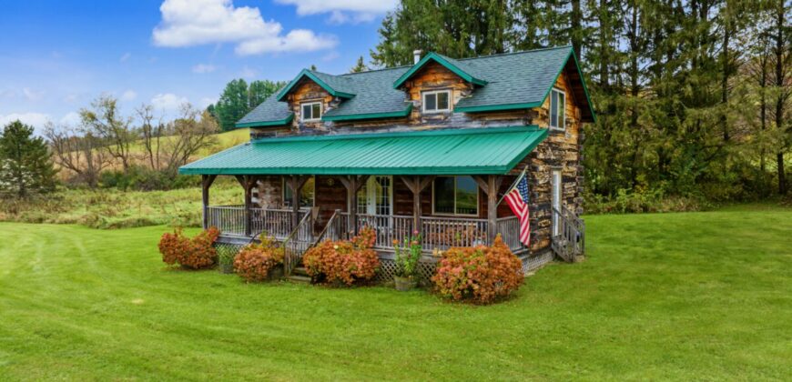 95.02-Acre Premier Whitetail Hunting Estate with Log Cabin, Pond