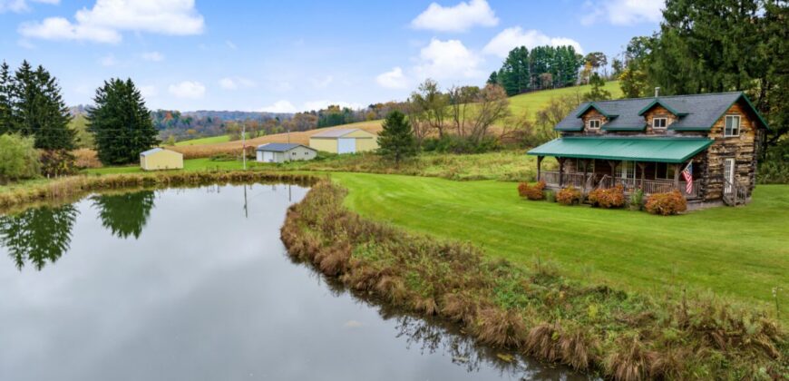 95.02-Acre Premier Whitetail Hunting Estate with Log Cabin, Pond