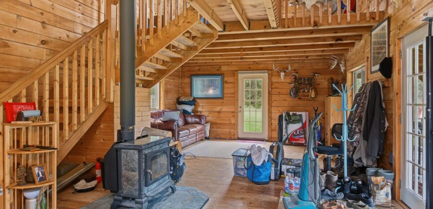 95.02-Acre Premier Whitetail Hunting Estate with Log Cabin, Pond
