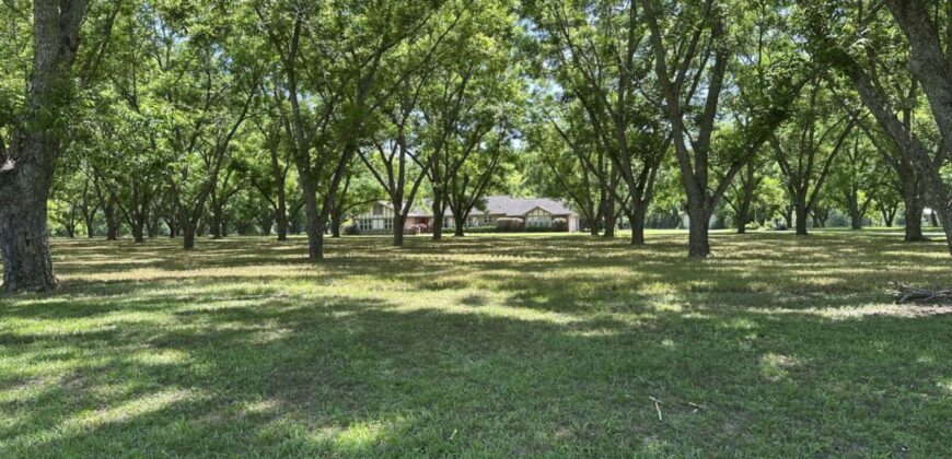Beautiful Homesite situated on 7.27 acres with mature pecan trees