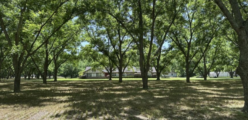 Beautiful Homesite situated on 7.27 acres with mature pecan trees