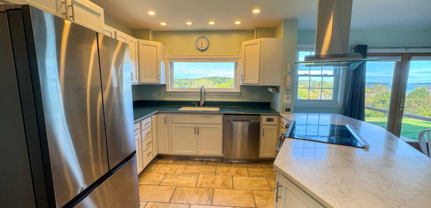 Charming Cape Cod Home with Bay Views on 9.24 Acres in Lubec, Mai