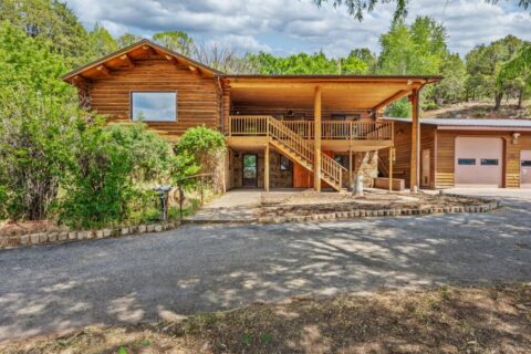 Colorado Log Home on 3.75 Acres For Sale with Pond, Orchard
