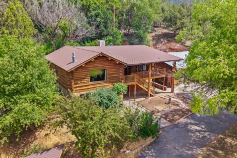 Colorado Log Home on 3.75 Acres For Sale with Pond, Orchard