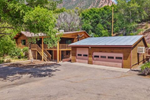 Colorado Log Home on 3.75 Acres For Sale with Pond, Orchard