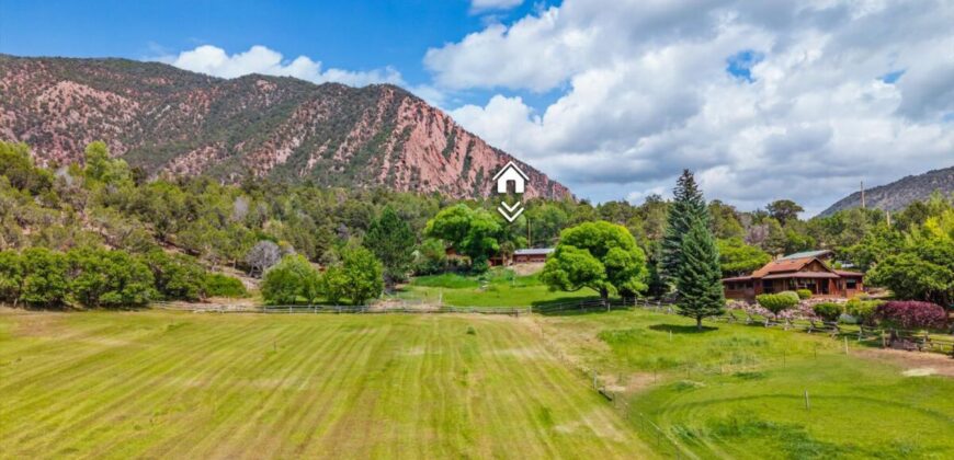 Colorado Log Home on 3.75 Acres For Sale with Pond, Orchard